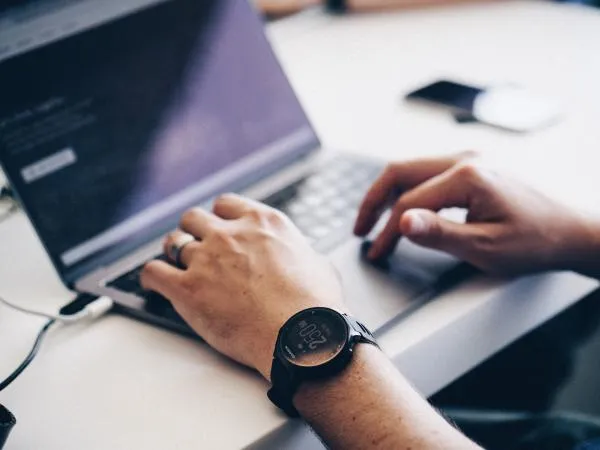 Microsoft access on training course with hands on laptop